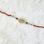 OM Rakhi with Artisan Craftsmanship OM Rakhi with Artisan Craftsmanship