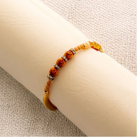 OM Rakhi with Fancy Beads and AD