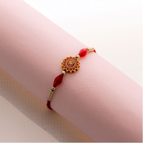 OM Rakhi with Red and Golden Beads