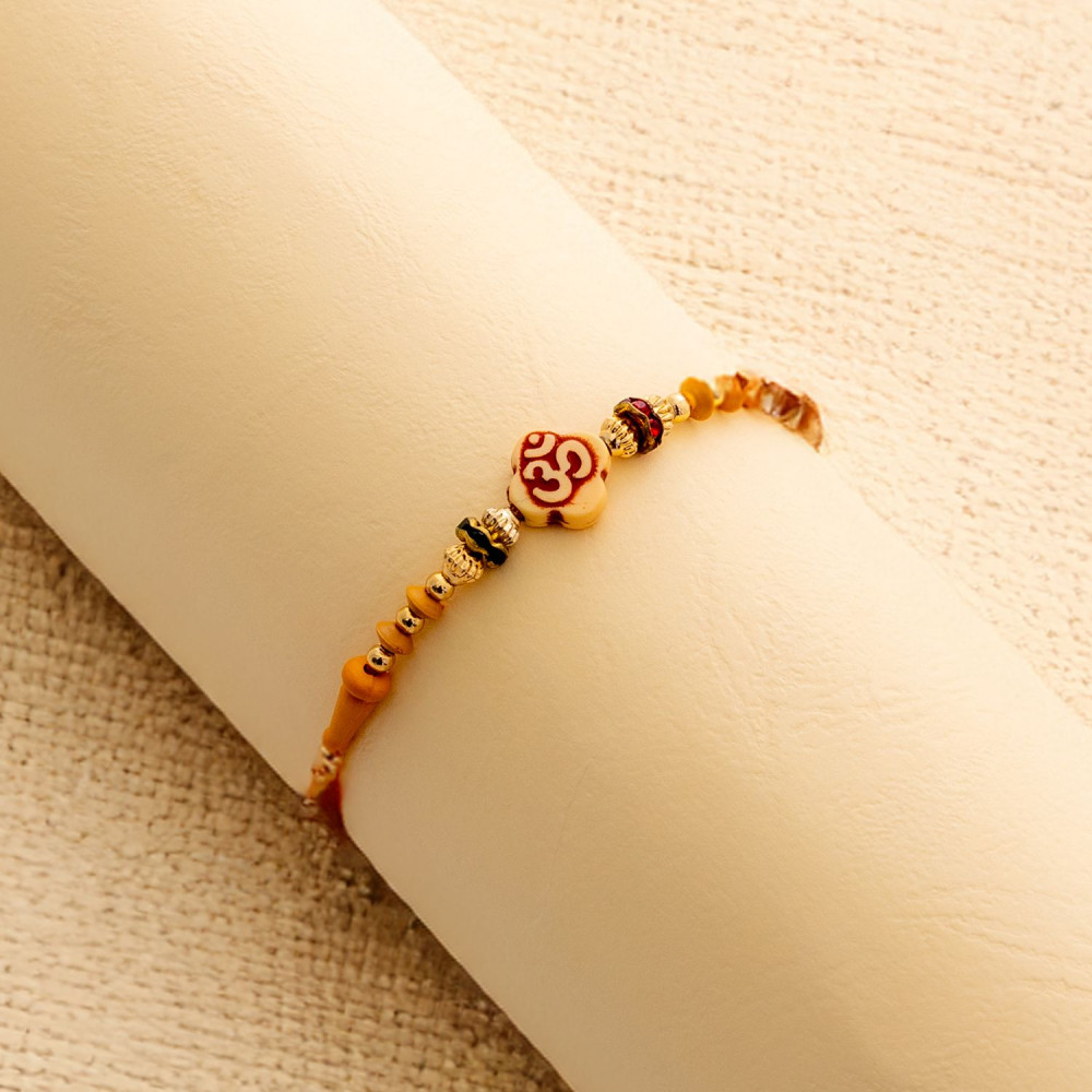 OM with Beads and AD Rakhi OM with Beads and AD Rakhi