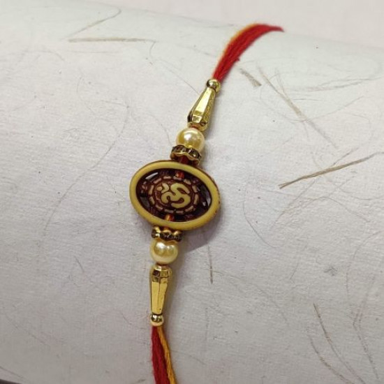 OM with Pearls and Golden Beads Rakhi