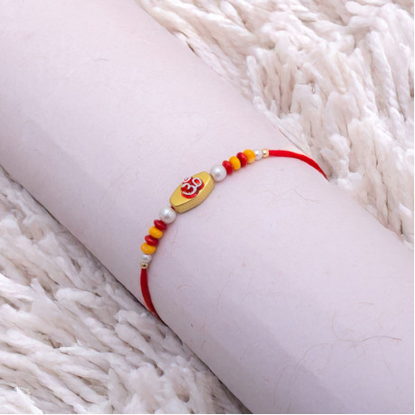 OM with Pearls and Multicolor Beads Rakhi