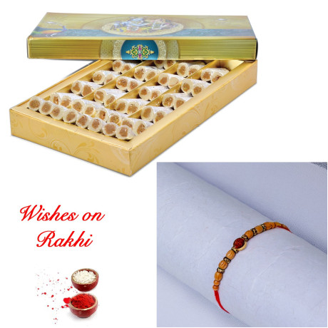 Opulent Rakhi and Anjir Roll Sweets for Brother