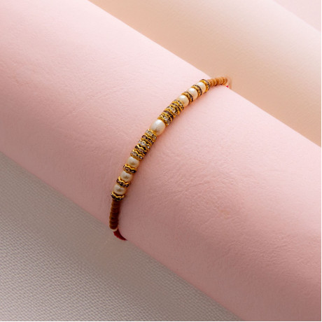Pearl and Diamond Rakhi: A Luxurious Gift