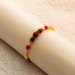 Pearls and Red Beads Work Triple Rudraksha Rakhi