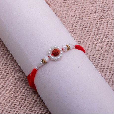 Pearls and Rudraksh Rakhi with American Diamonds