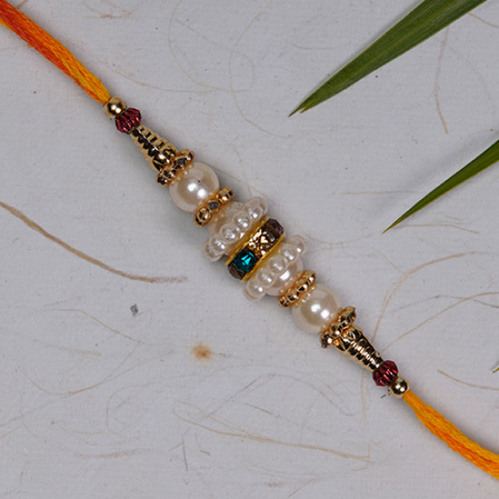 Pearls Rakhi with Golden Beads