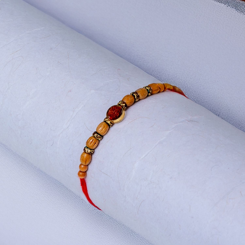 Pious Rudraksh Charm Rakhi Pious Rudraksh Charm Rakhi