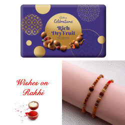 Opulent Rudraksh Rakhi Set and Cadbury Rich Dryfruit Collection Box Opulent Rudraksh Rakhi Set and Cadbury Rich Dryfruit Collection Box