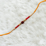 Red and Golden Beads Work Rudraksha Rakhi Red and Golden Beads Work Rudraksha Rakhi