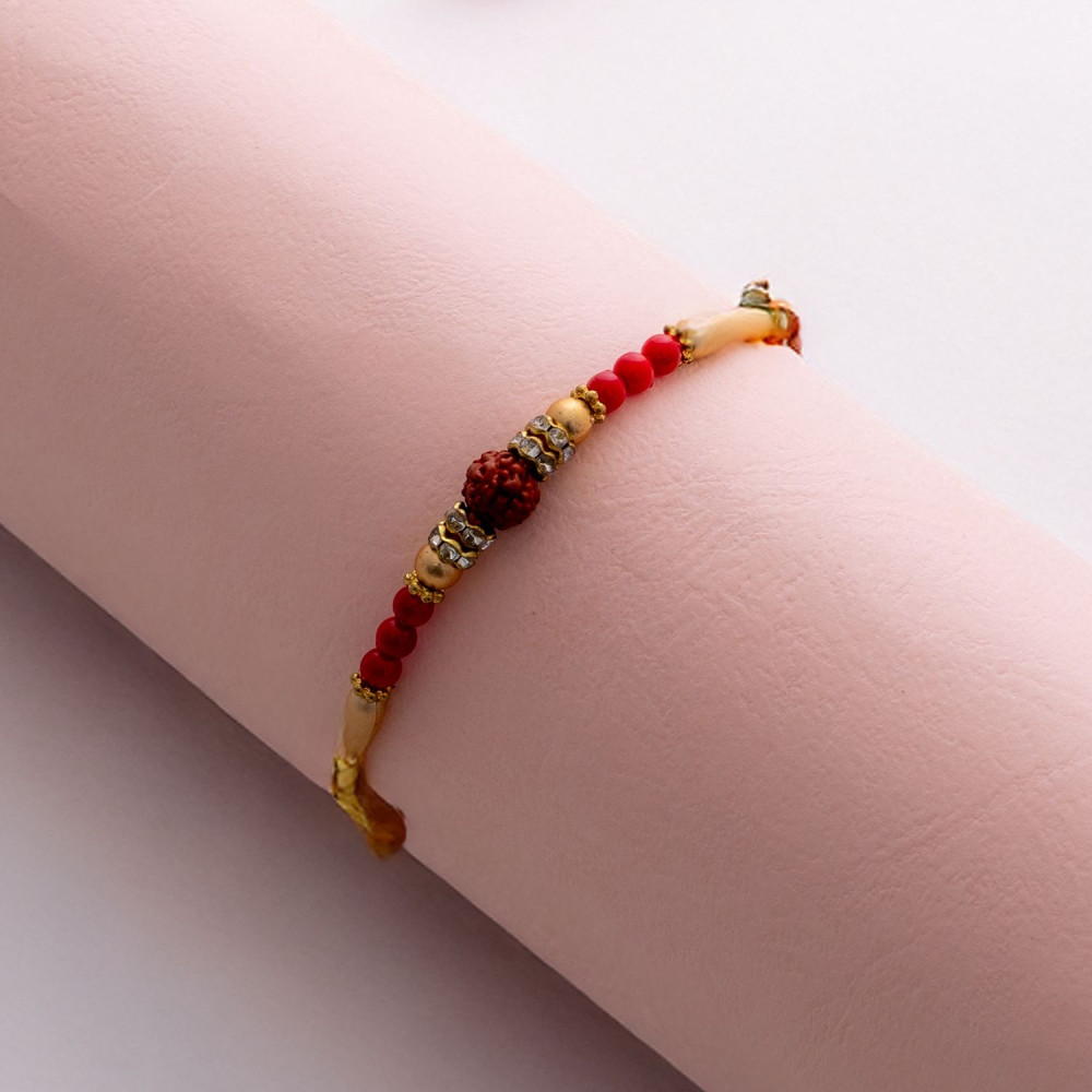 Red and Golden Beads Work Rudraksha Rakhi Red and Golden Beads Work Rudraksha Rakhi