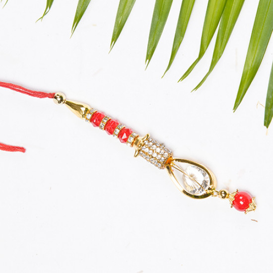 Red and White Crystals and Beads Studded Lumba Rakhi