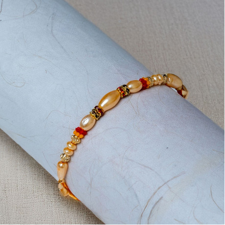 Refined Pearl Cluster Rakhi