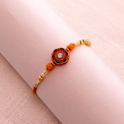 Refined Pearl Rakhi with Diamond Design