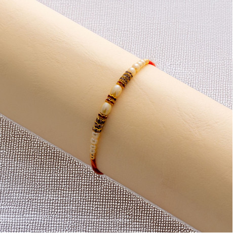 Refined Pearl Rakhi with Diamond Design