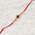 Rudraksh and Beads Studded Rakhi Rudraksh and Beads Studded Rakhi