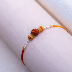 Rudraksh with Pearls and Beads Rakhi Rudraksh with Pearls and Beads Rakhi