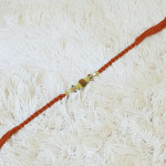 Rudraksha Aura Rakhi with Sacred Thread Rudraksha Aura Rakhi with Sacred Thread
