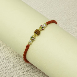 Rudraksha Aura Rakhi with Sacred Thread Rudraksha Aura Rakhi with Sacred Thread