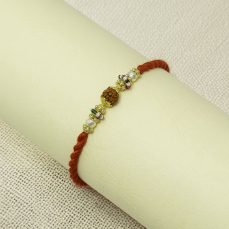 Rudraksha Aura Rakhi with Sacred Thread Rudraksha Aura Rakhi with Sacred Thread
