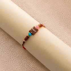 Rustic Beads Rakhi with Shining Diamonds and Enamel Work