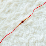 Rustic Wooden Beads Rakhi with Holy Rudraksh Rustic Wooden Beads Rakhi with Holy Rudraksh