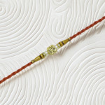 Sacred OM Rakhi with Antique Gold Finish