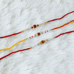 Sacred Rudraksha Rakhi Set of 3 for Beloved Brother Sacred Rudraksha Rakhi Set of 3 for Beloved Brother