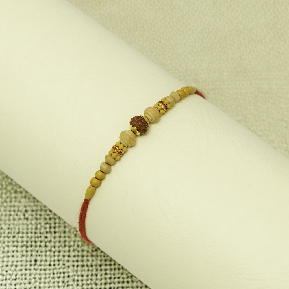 Sacred Rudraksha Rakhi with Red Thread Sacred Rudraksha Rakhi with Red Thread
