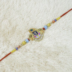 Shreenathji Rakhi with Elegant Stone Embellishments Shreenathji Rakhi with Elegant Stone Embellishments