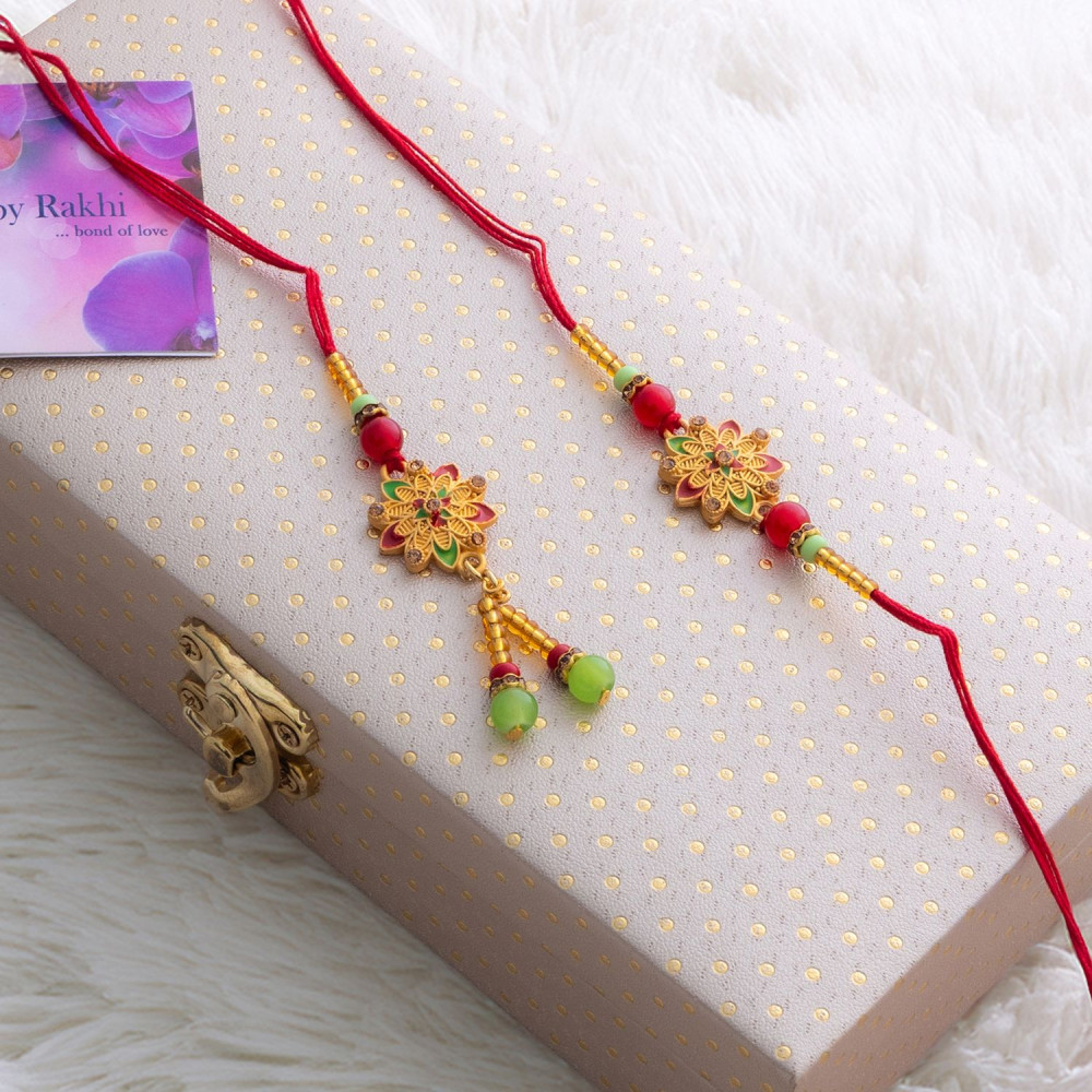 Sleek Enamelled Bhaiya Bhabhi Rakhi with Stylish Box Sleek Enamelled Bhaiya Bhabhi Rakhi with Stylish Box