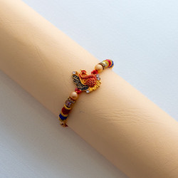 Sophisticated Beads Rakhi with Peacock Sparkle