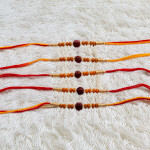 Sophisticated Craft: Set of 5 Rakhis with Rudraksh and Beads Sophisticated Craft: Set of 5 Rakhis with Rudraksh and Beads