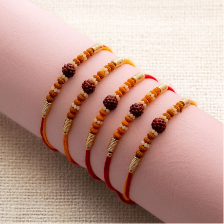 Sophisticated Craft: Set of 5 Rakhis with Rudraksh and Beads Sophisticated Craft: Set of 5 Rakhis with Rudraksh and Beads