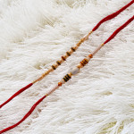 Sophisticated Pair of Rakhis with Pearls Sophisticated Pair of Rakhis with Pearls