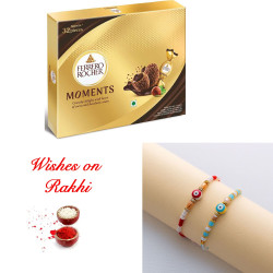 Sophisticated Set of 2 Rakhis with Ferrero Rocher Moments Sophisticated Set of 2 Rakhis with Ferrero Rocher Moments