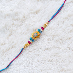 Sparkling Multicolor AD and Golden Beads Rakhi Sparkling Multicolor AD and Golden Beads Rakhi