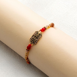 Stylish Beads Rakhi with OM centerpiece