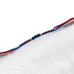 Stylish PomPom Rakhi with AD and Beads Charm