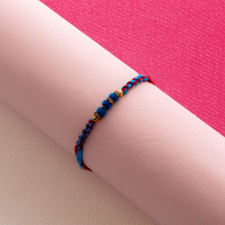 Stylish PomPom Rakhi with AD and Beads Charm