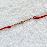 Traditional Beads Rakhi with OM Symbol