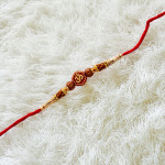 Traditional OM Rakhi with Beads Accents Traditional OM Rakhi with Beads Accents