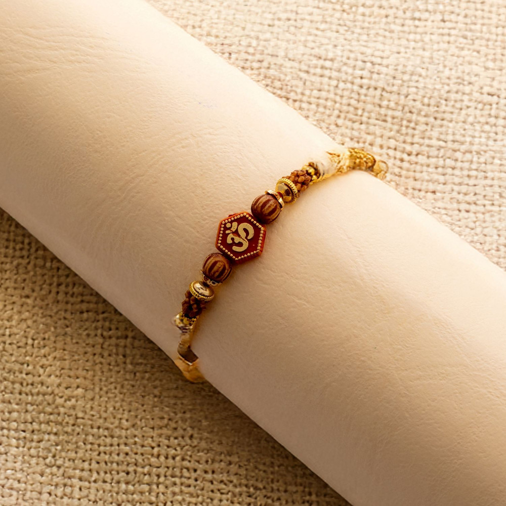 Traditional OM Rakhi with Beads Accents Traditional OM Rakhi with Beads Accents