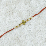 Traditional Rakhi with Ganesha Charm Traditional Rakhi with Ganesha Charm
