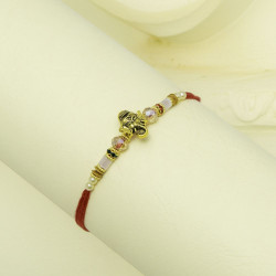 Traditional Rakhi with Ganesha Charm