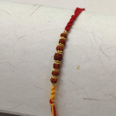 Traditional Rudraksh Rakhi with Mauli Thread Traditional Rudraksh Rakhi with Mauli Thread