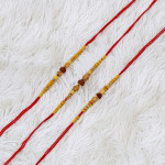 Traditional Rudraksha Rakhi Combo Set of 3 Traditional Rudraksha Rakhi Combo Set of 3