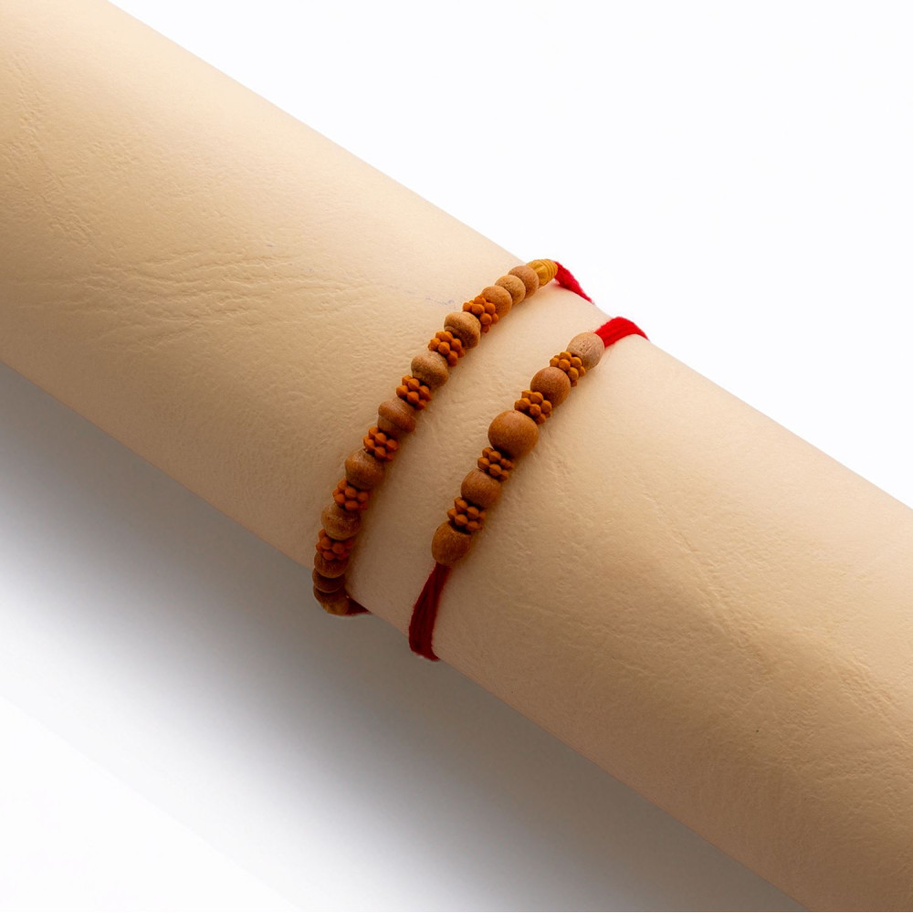Traditional Set of 2 Rakhis with Wooden Beads Traditional Set of 2 Rakhis with Wooden Beads