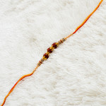 Triple Rudraksh with AD and Beads Rakhi Triple Rudraksh with AD and Beads Rakhi