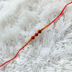 Triple Rudraksha with Wooden Beads Rakhi Triple Rudraksha with Wooden Beads Rakhi